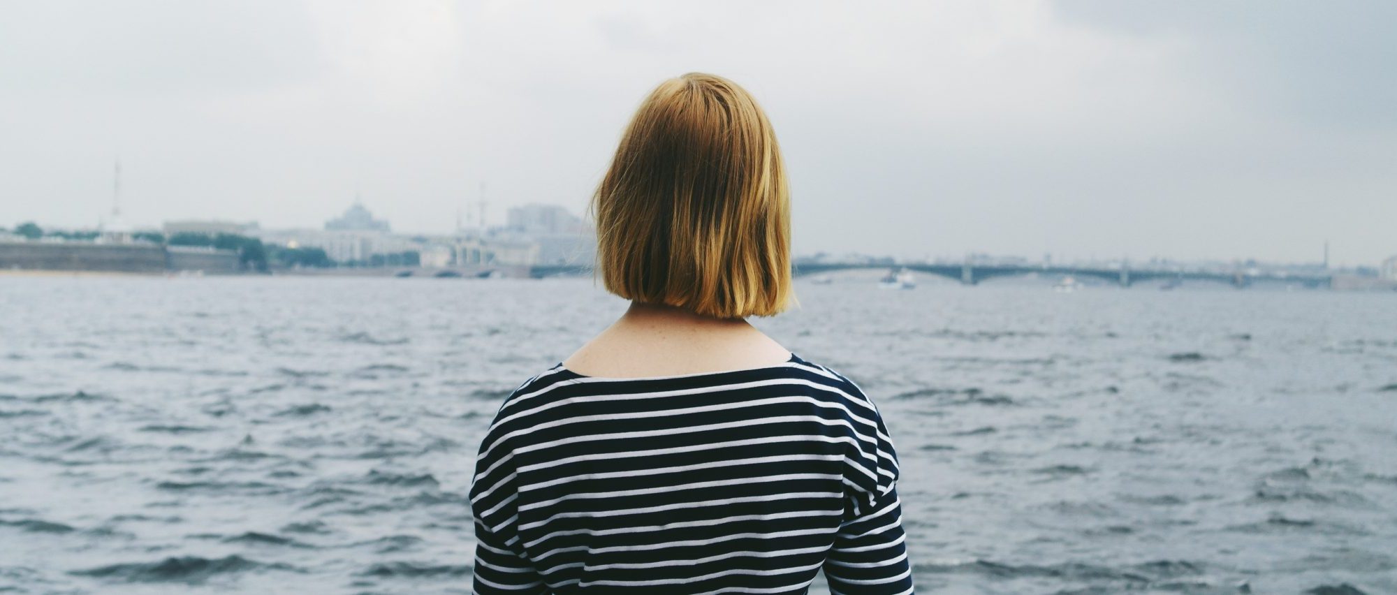 Woman looking oout to sea