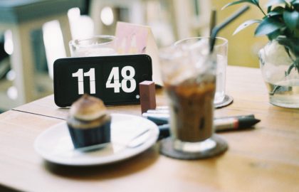 Drink, cake and clock