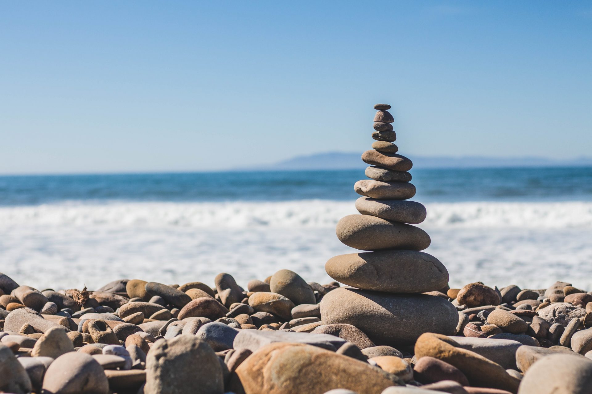 Tower of pebbles on the beach